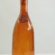 Amber bottle in bubbled blown glass, signed Biot – France, vintage 1970s