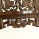 Carved wooden wall shelf