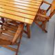 Salon de jardin vintage composé d’une table avec rallonges et 4 fauteuils