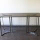 Smoked glass console with chrome legs, 1970.
