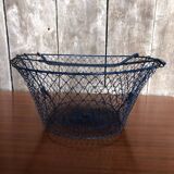 Old foldable blue metal basket, vintage handles