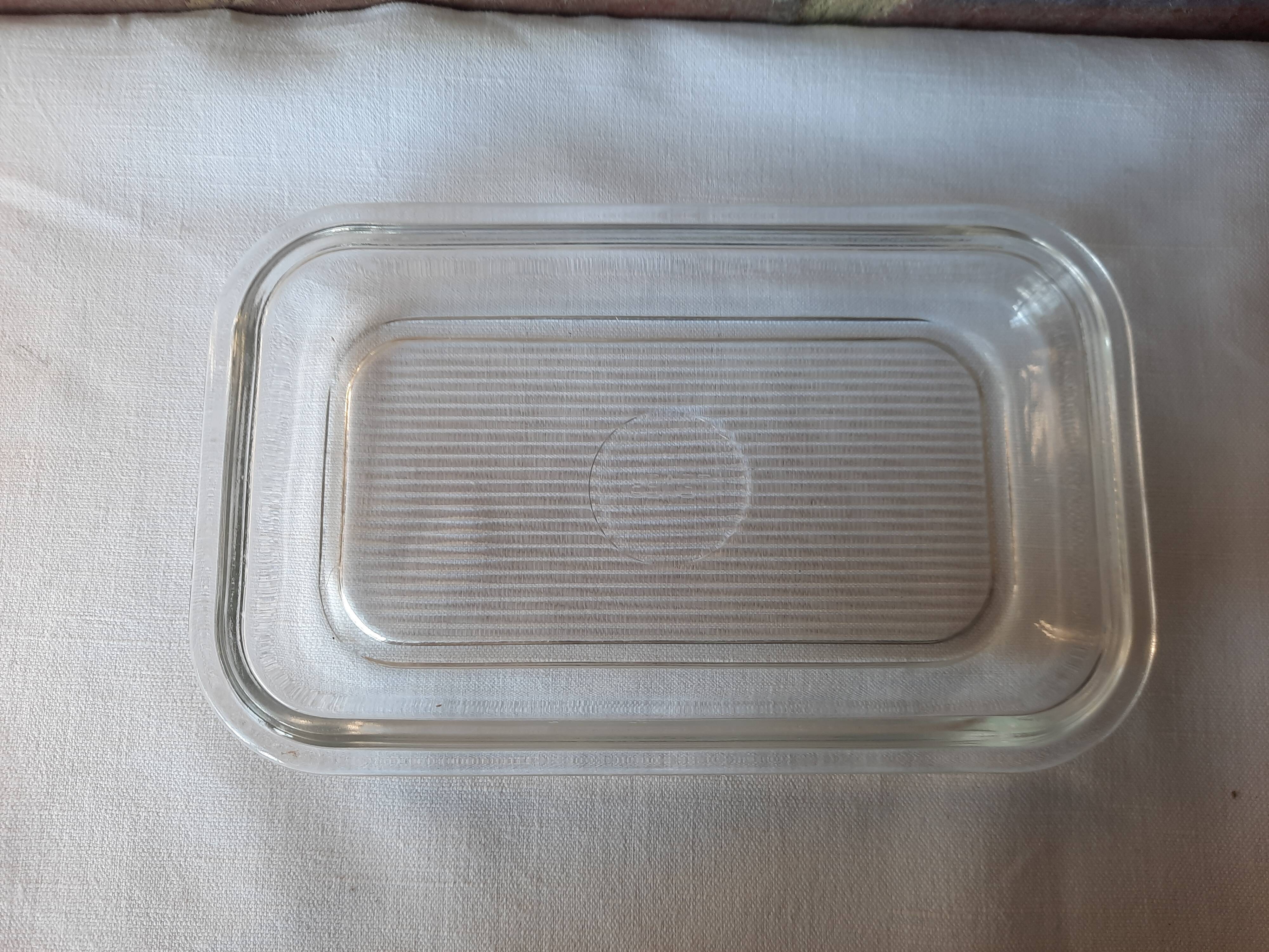 Transparent glass butter dish from lever