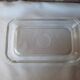Transparent glass butter dish from lever