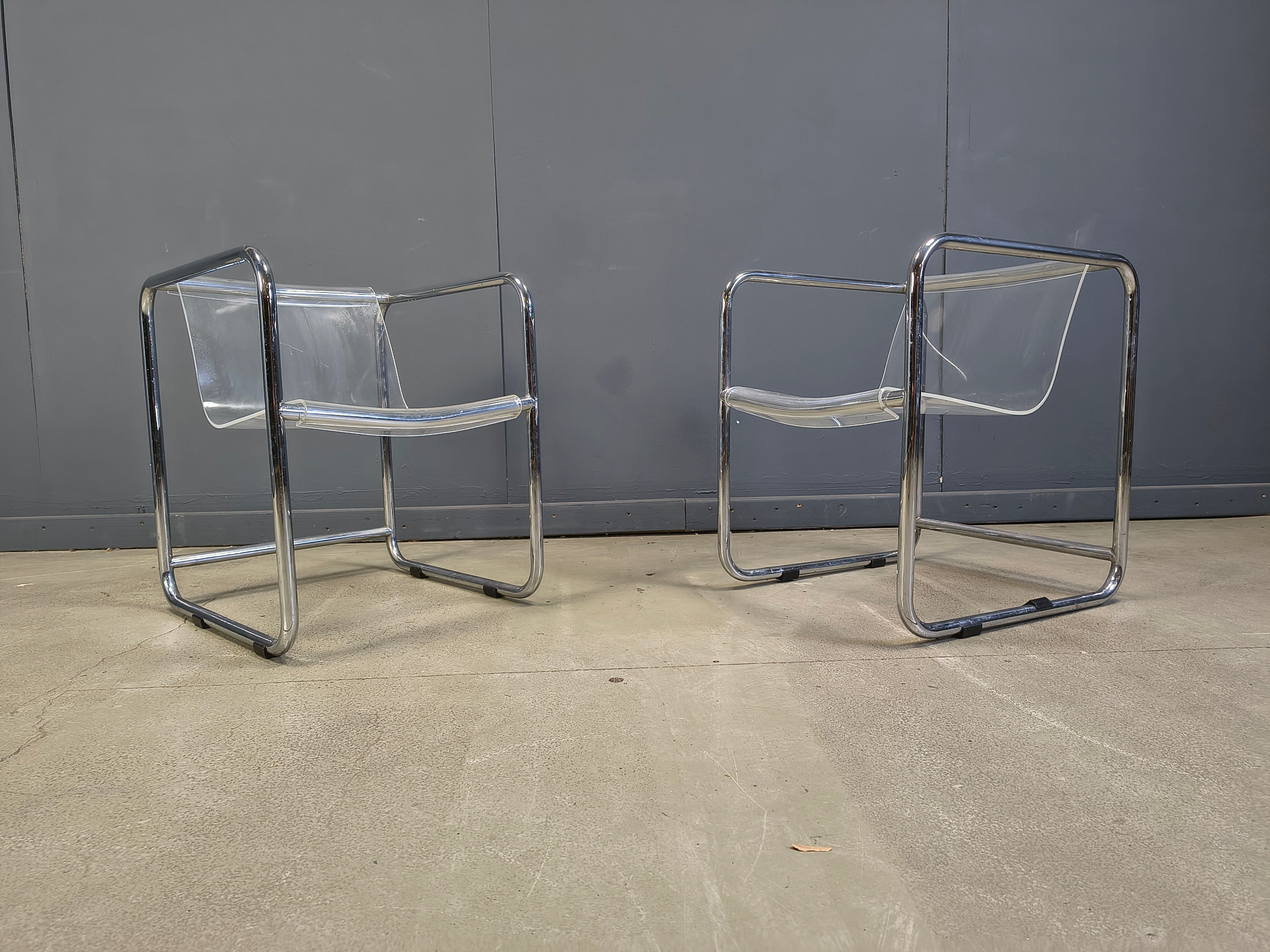 Pair of plexiglass and tubular chrome armchairs, 1970s
