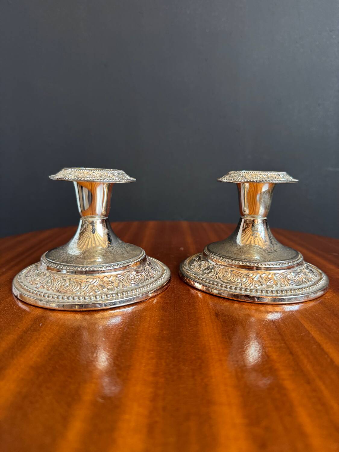 Silver-plated metal candlesticks from the 1980s.