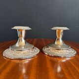 Silver-plated metal candlesticks from the 1980s.