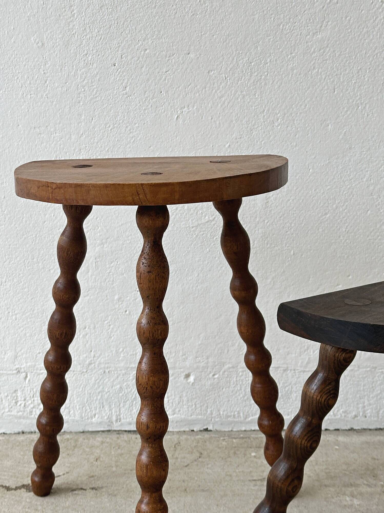 2 antique solid wood stools with turned legs
