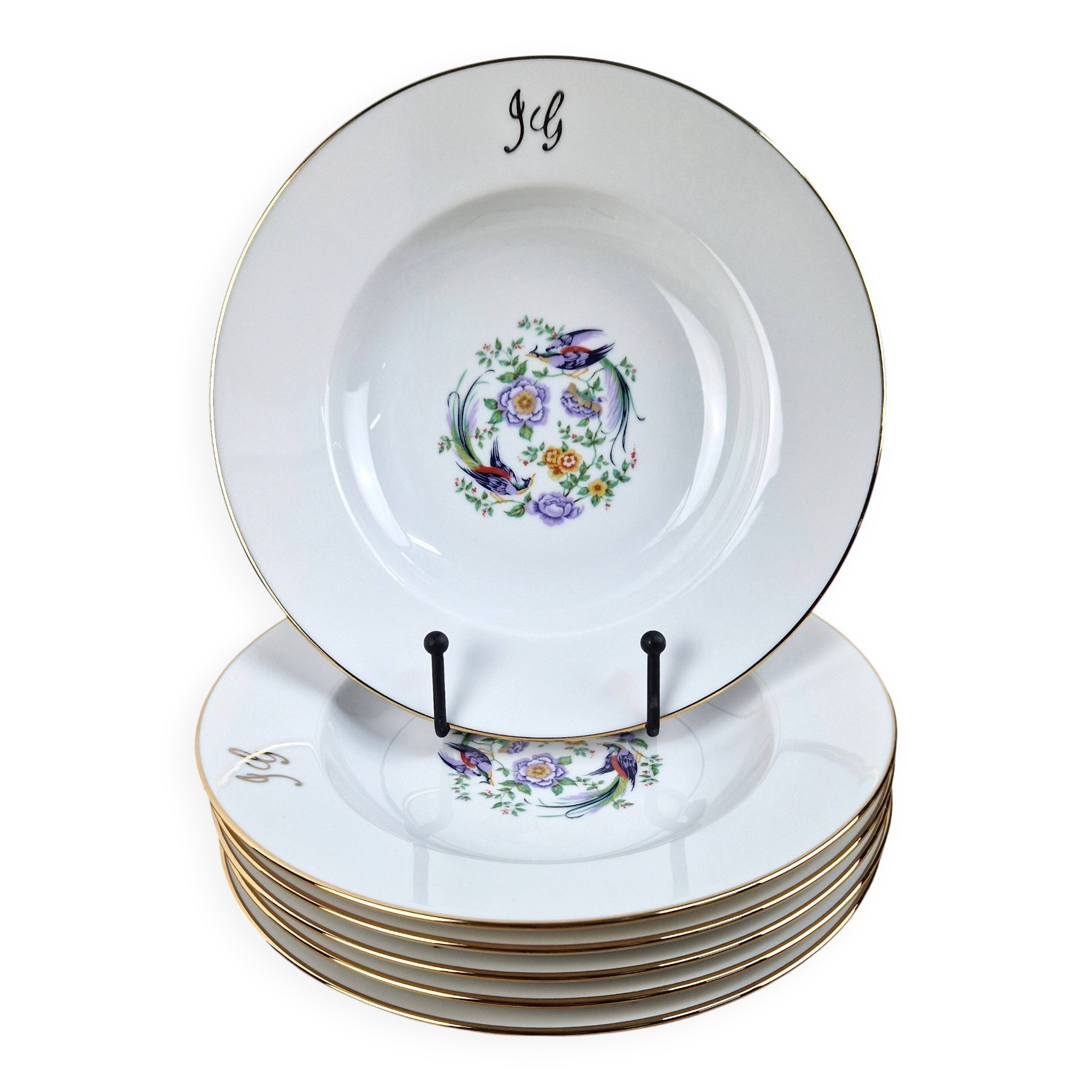 6 deep plates made of Limoges porcelain with a paradise bird design.