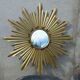 Gold metal sun mirror