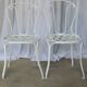 Pair of antique garden chairs, wrought iron, white paint.