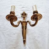 French Empire-style wall sconce or chandelier in bronze with an antique gold patina.