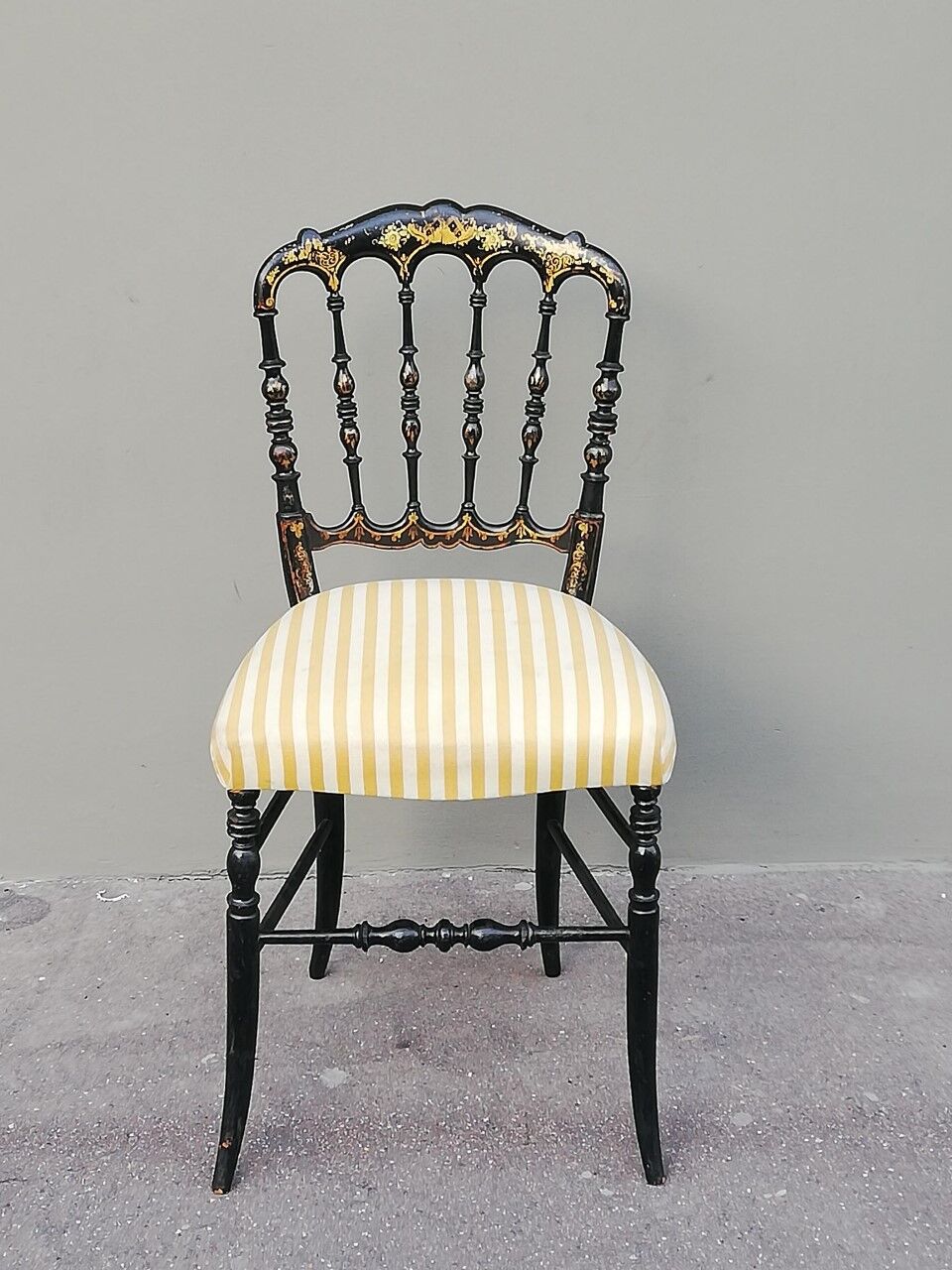 Napoleon III chair late 19th in blackened wood with gilded patterns