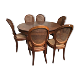 Table and six chairs in the Louis XVI style mahogany
