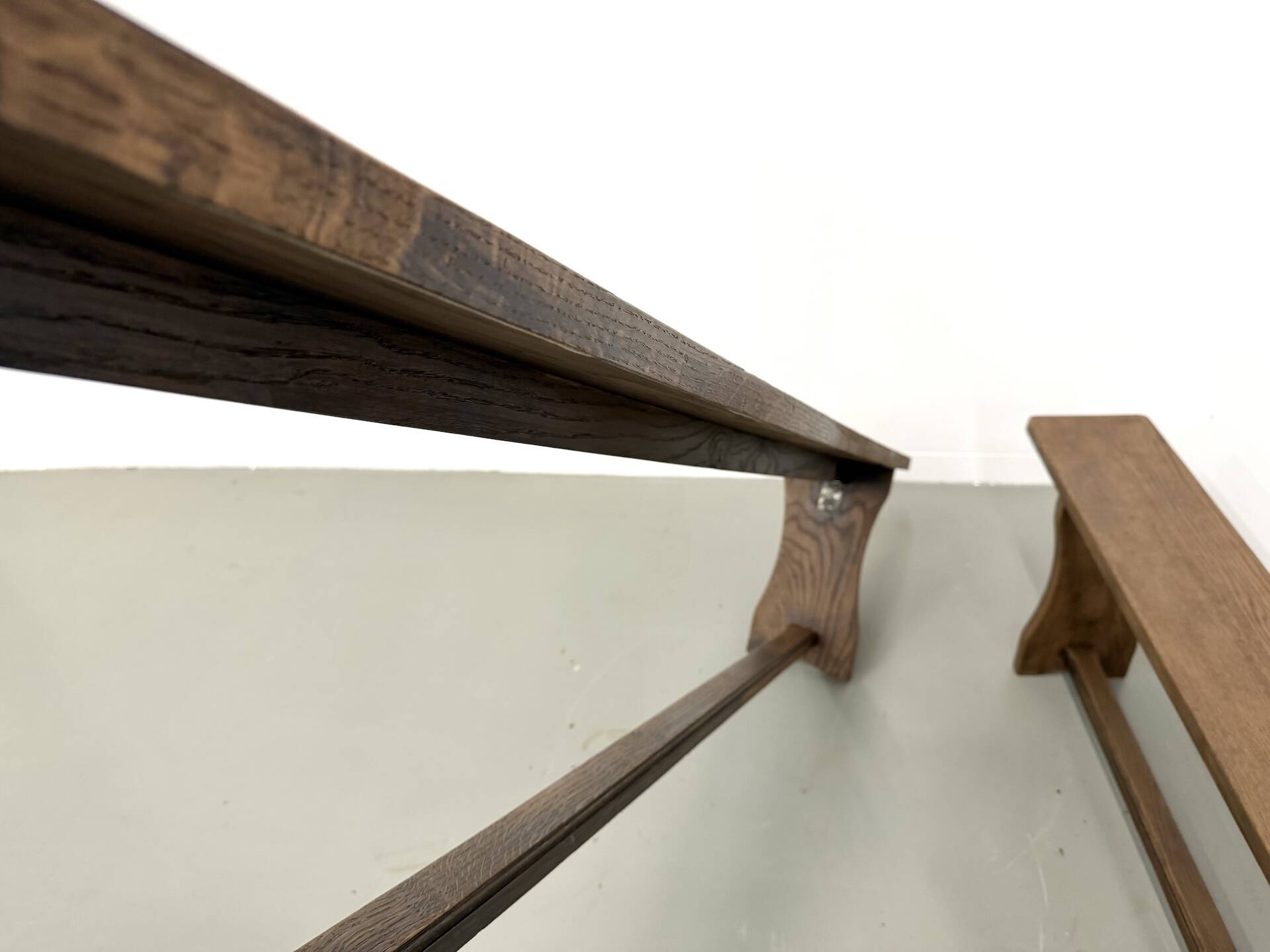 Pair of solid oak benches, winged legs, France, 1970s