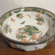 Shallow porcelain dish from Limoges Raynaud, bird decoration.