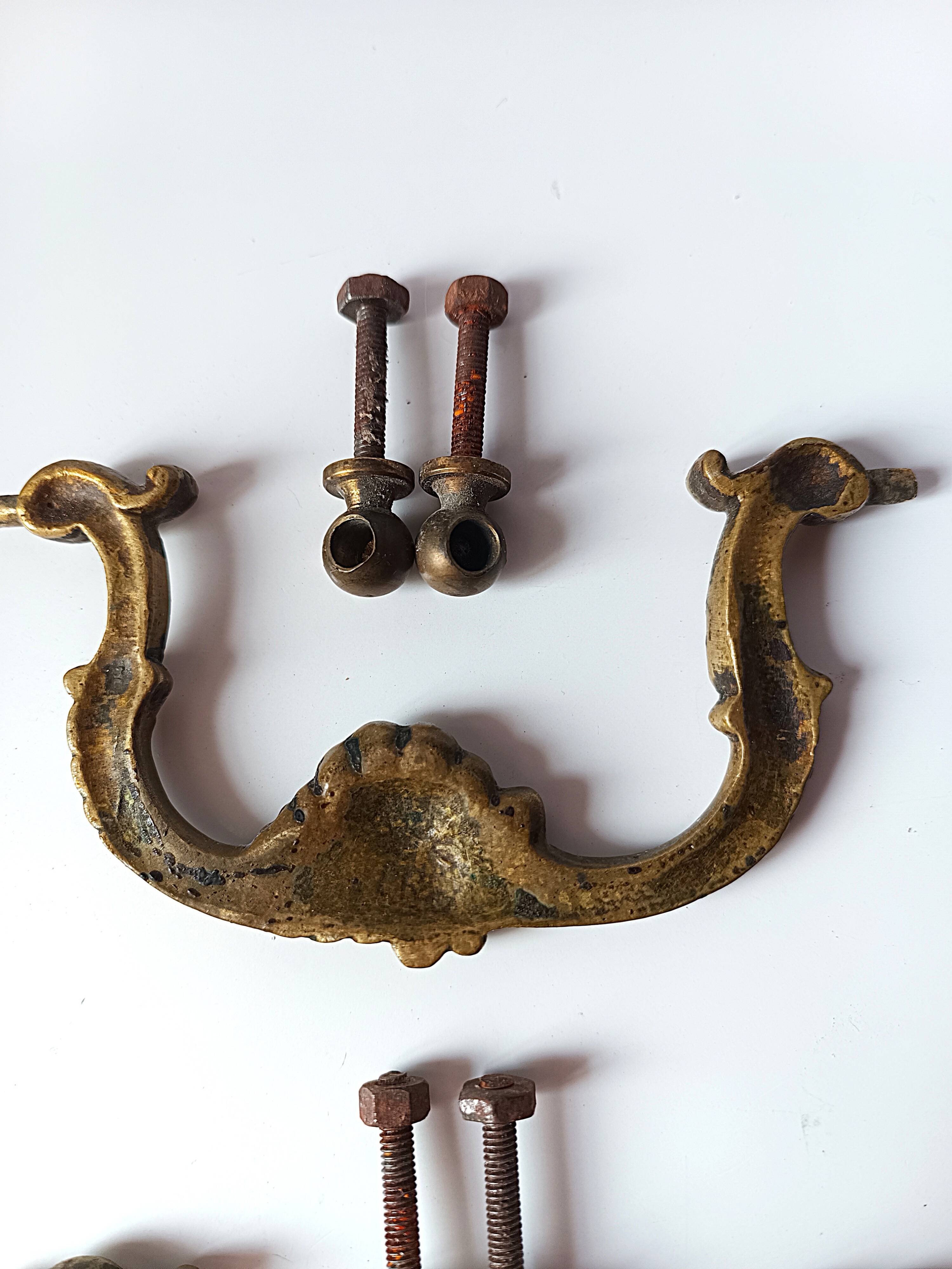 Antique pair of bronze drawer handles.