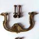 Antique pair of bronze drawer handles.