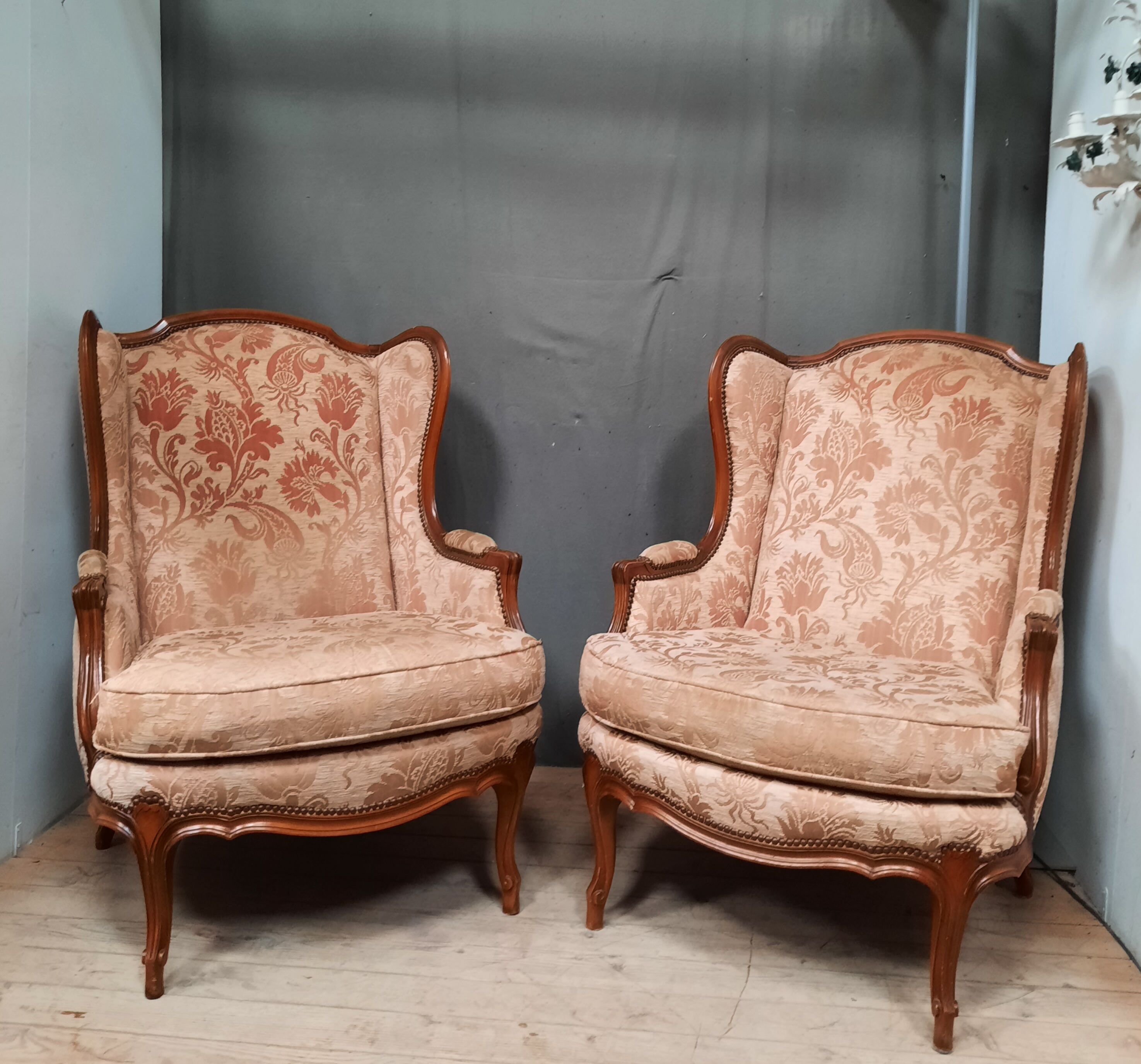 Pair of Louis XV style wing chairs