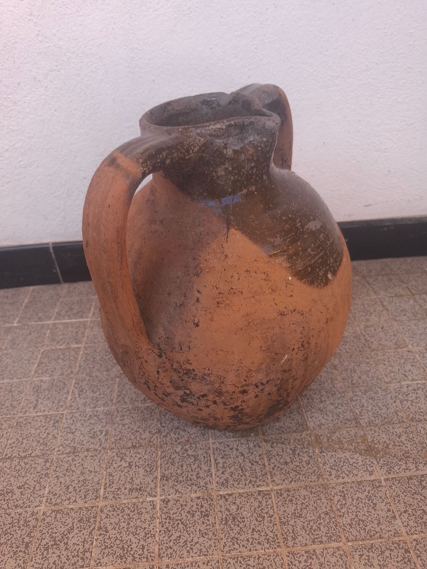 Jug, I stop at glazed terracotta oil.