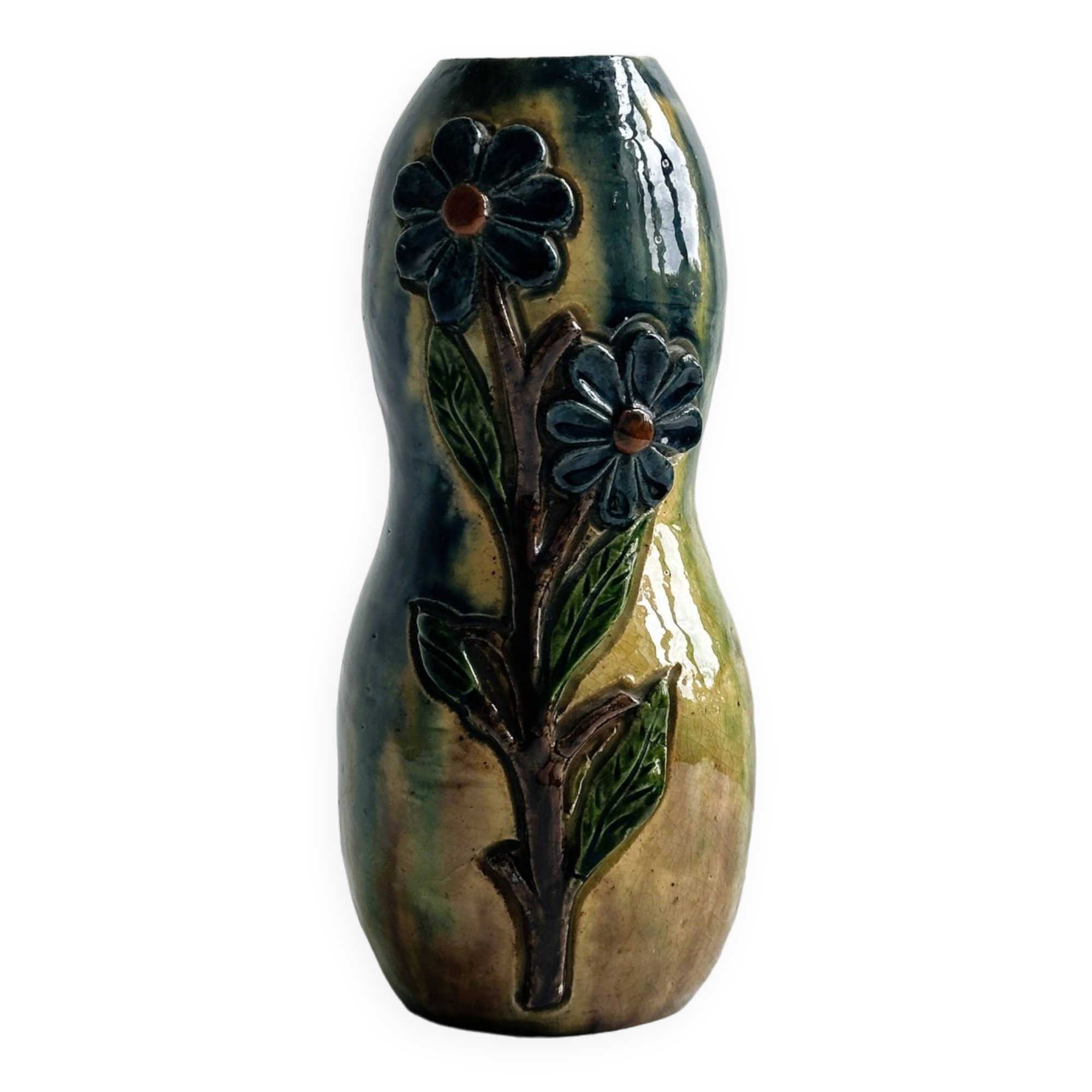 Very colorful glazed earthenware vase, old vase with floral decoration.