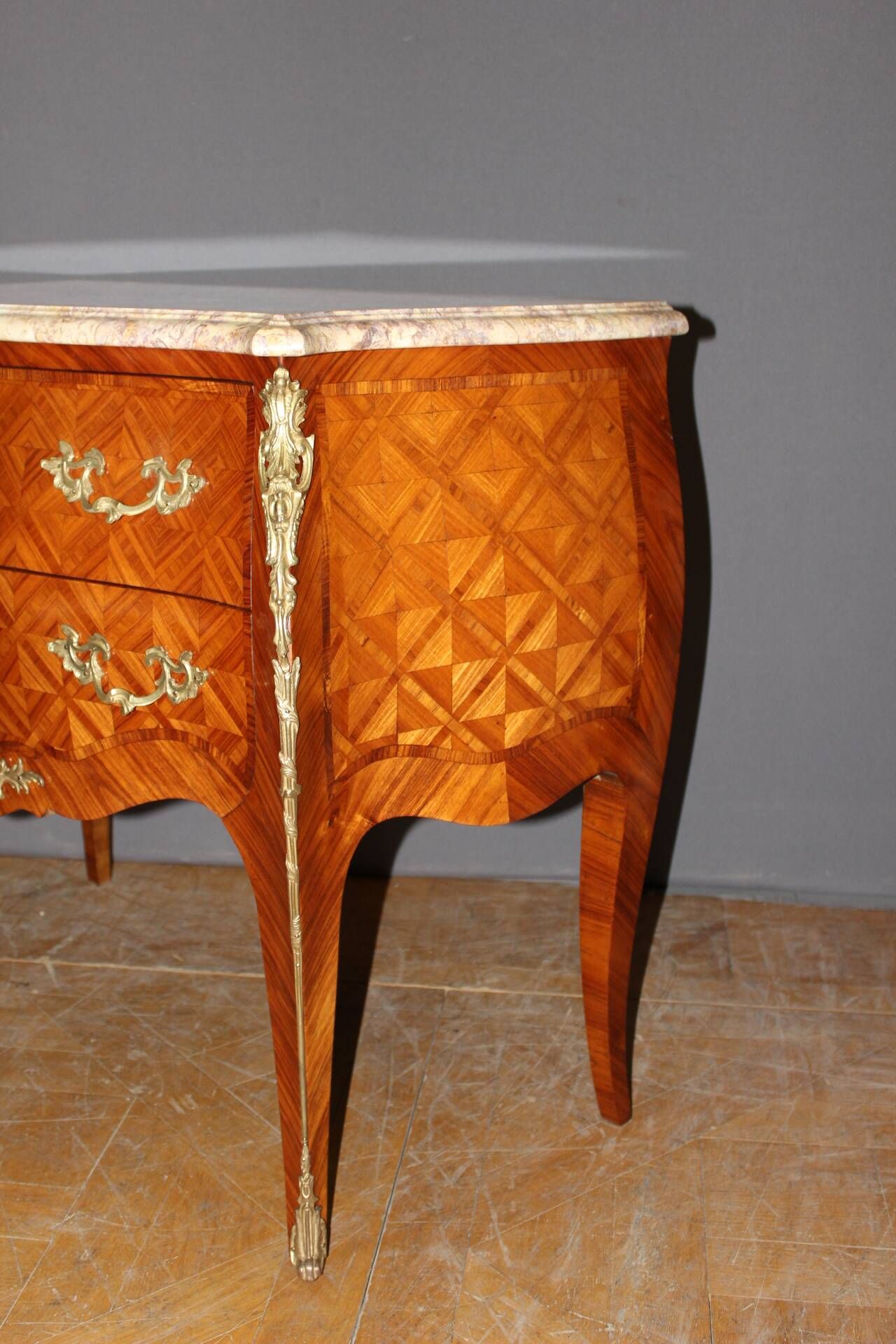 Louis XV commode in marquetry