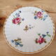 Lot de 6 tasses à café et sous-tasses décor fleuri et liseré doré, porcelaine de Limoges Bernardaud