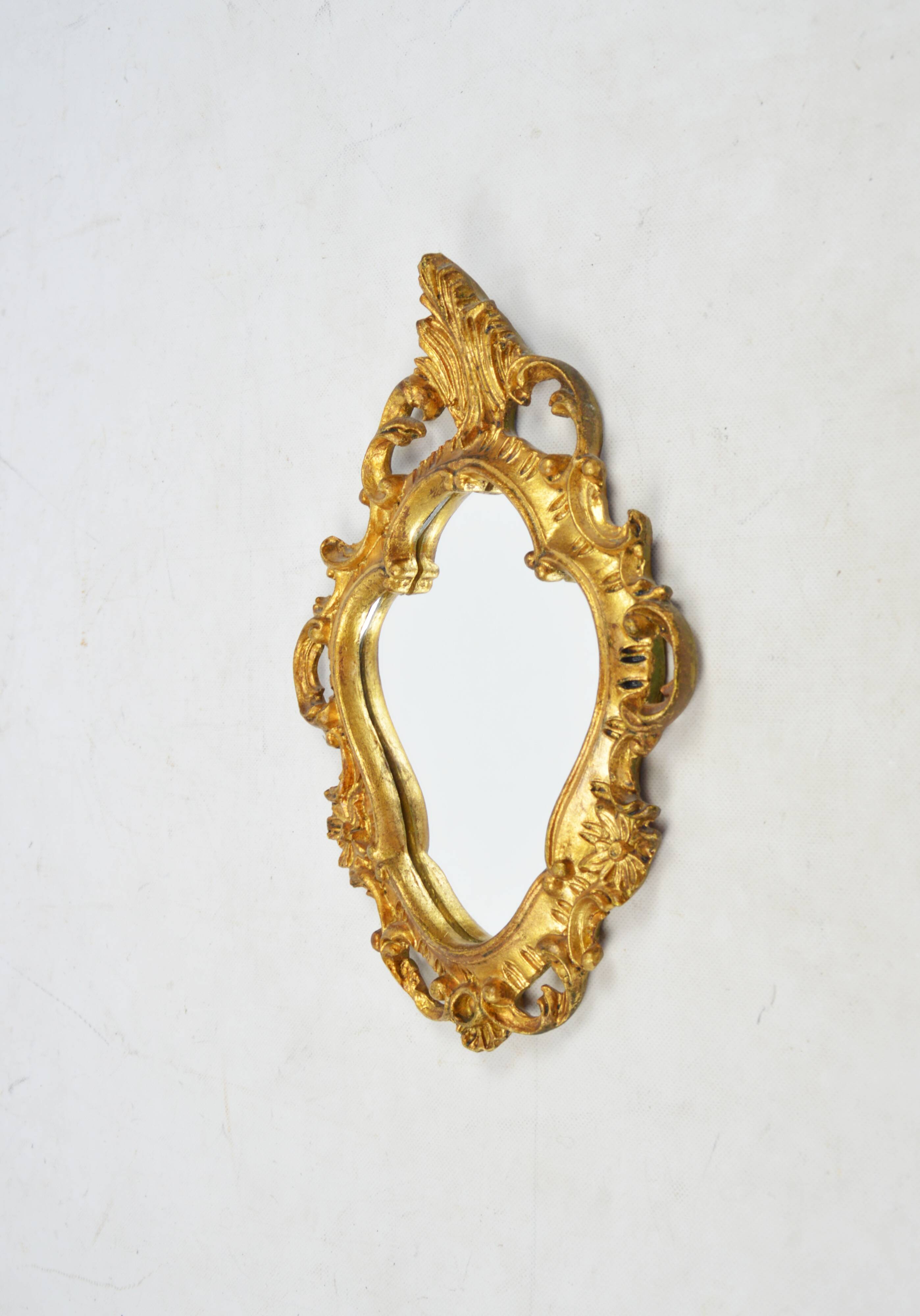 Mirror in a decorative frame, 1970s