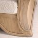 Rattan armchair by Betty Cobonpue