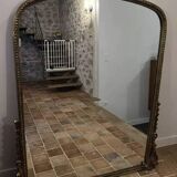 Large gilded mirror with pediment