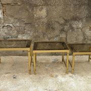 Brass, gold metal and 70s mirror glass tables