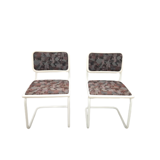 Pair of vintage tubular frame dining chairs