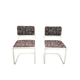 Pair of vintage tubular frame dining chairs