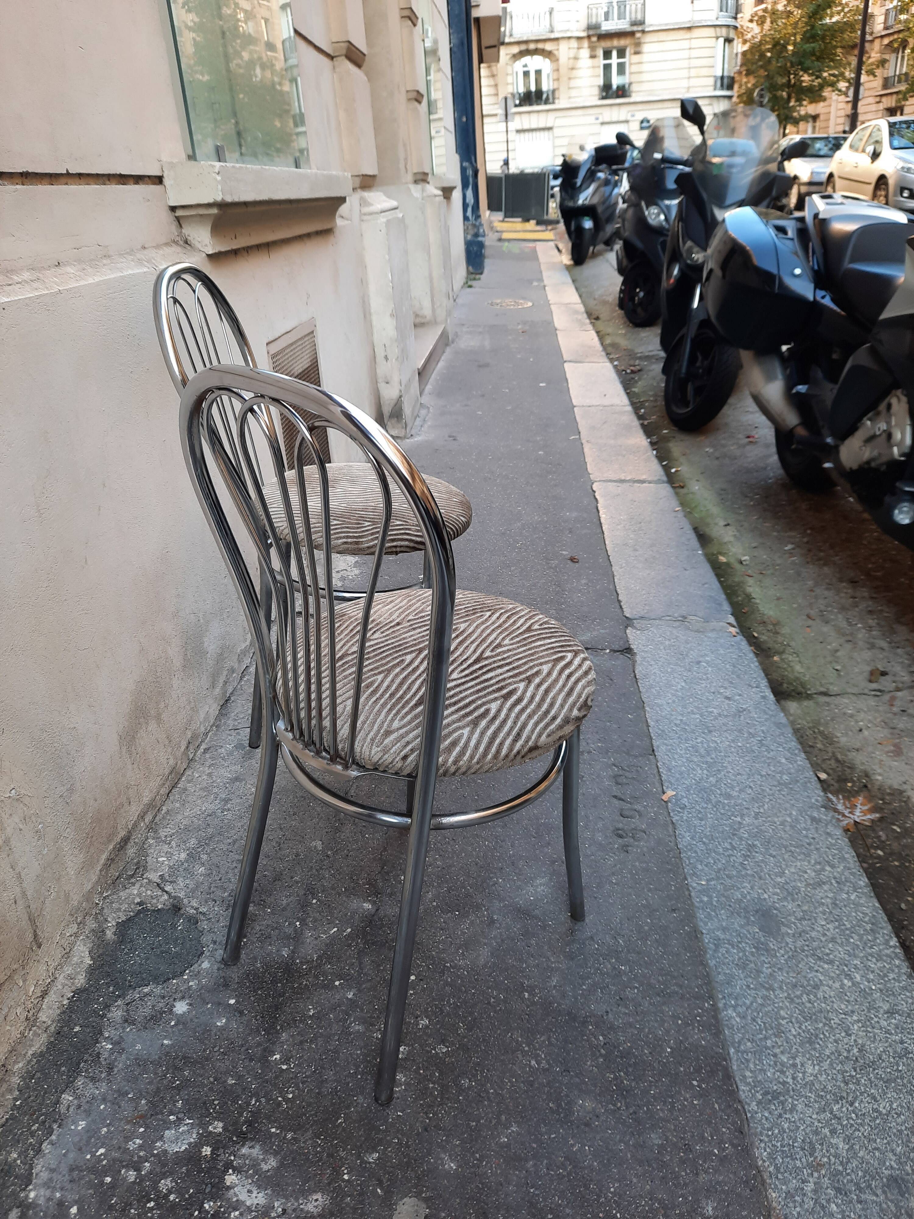 Pair of tubular metal bistro chairs