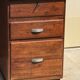Modernist desk in wood and green moleskin upholstery