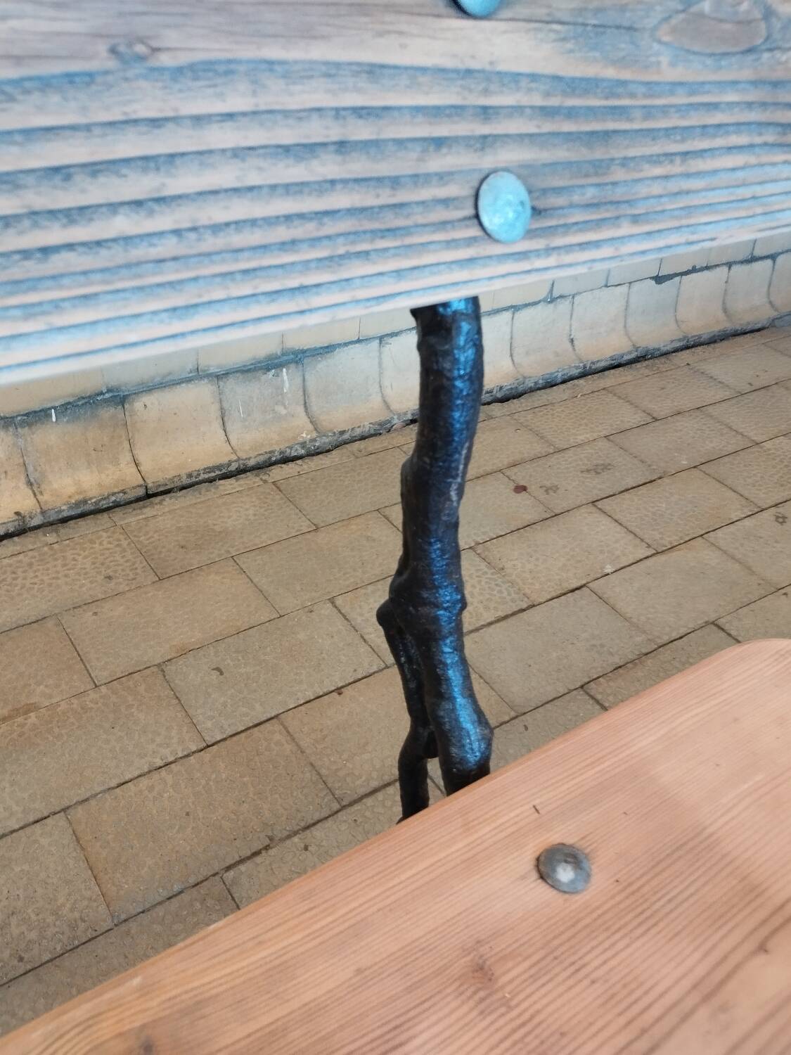 Antique garden bench with cast iron legs