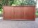 Low sideboard with 3 sliding doors in teak. Denmark 1960