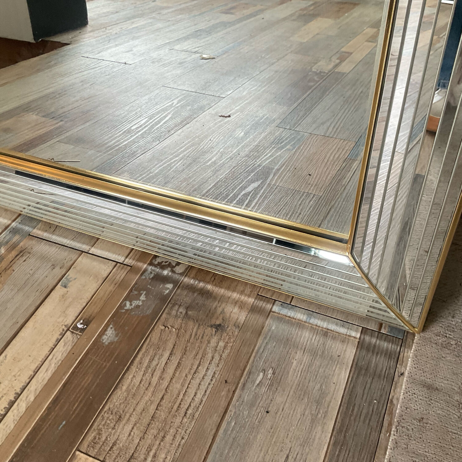 Large vintage Hollywood Regency style mirror with shutters.