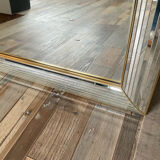 Large vintage Hollywood Regency style mirror with shutters.