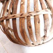 Old wooden harvest basket, slatted wooden basket, folk art.