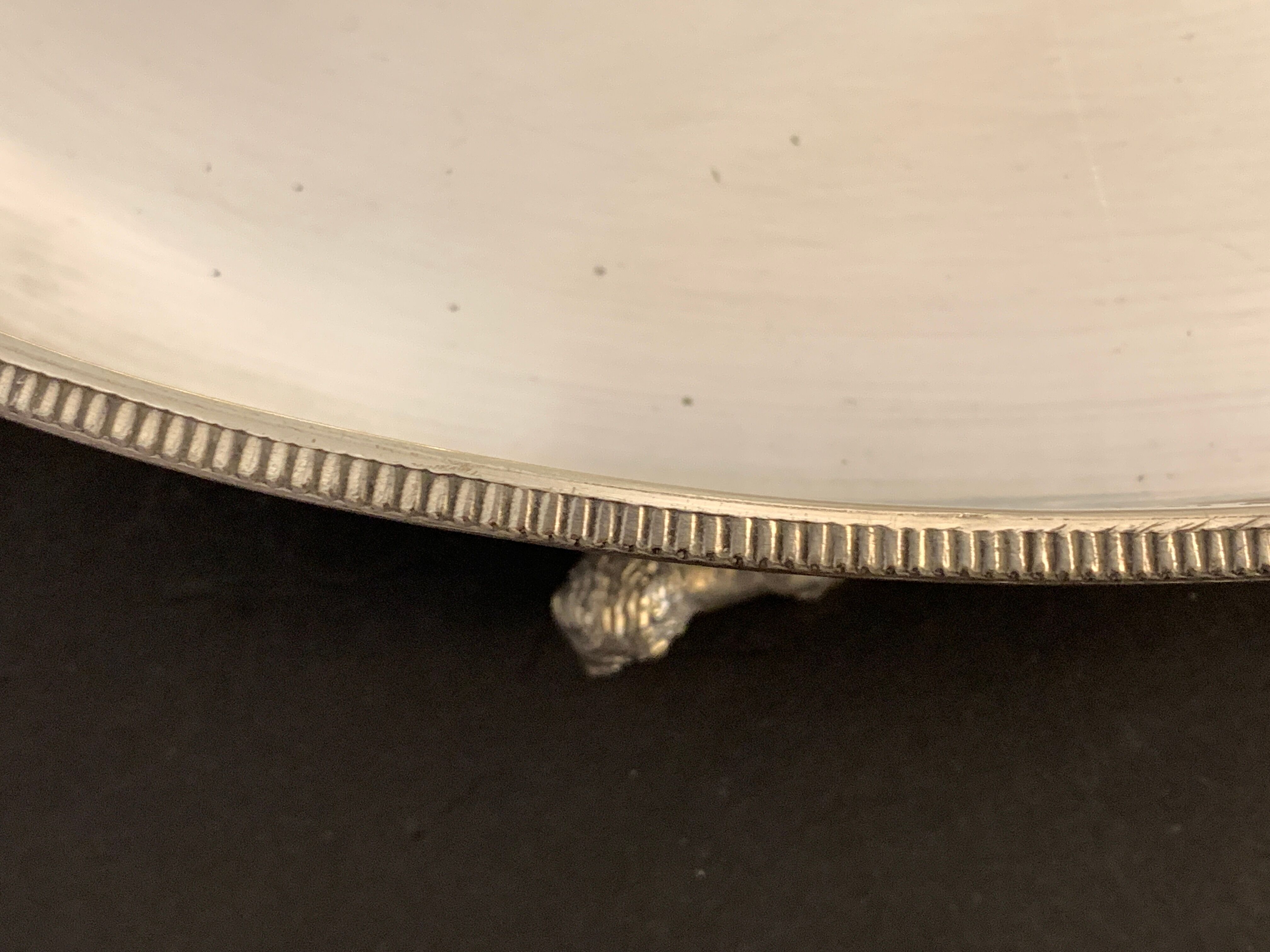 Alpaca silver metal to  lion feet and openwork borders