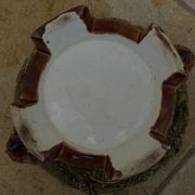 Old earthenware cachepot with woman decoration