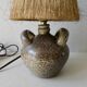 Sandstone lamp with natural fiber lampshade