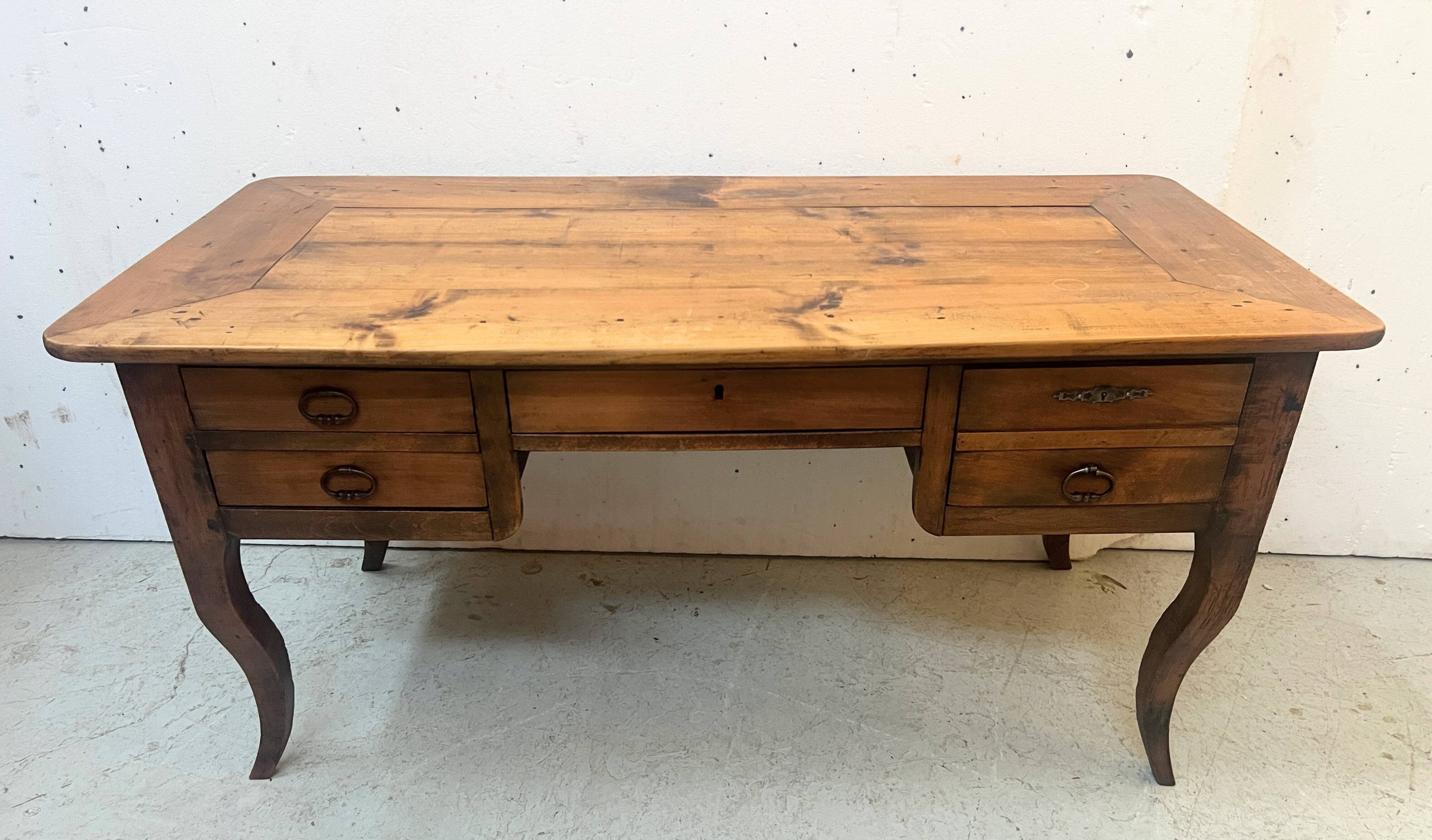 Provincial desk made of solid cherry wood, 20th century.