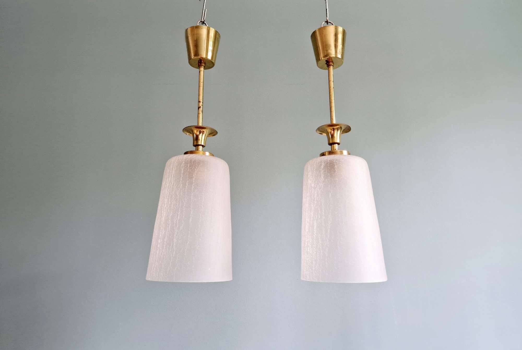 Pair of brass and cracked glass pendants, 1950-60.