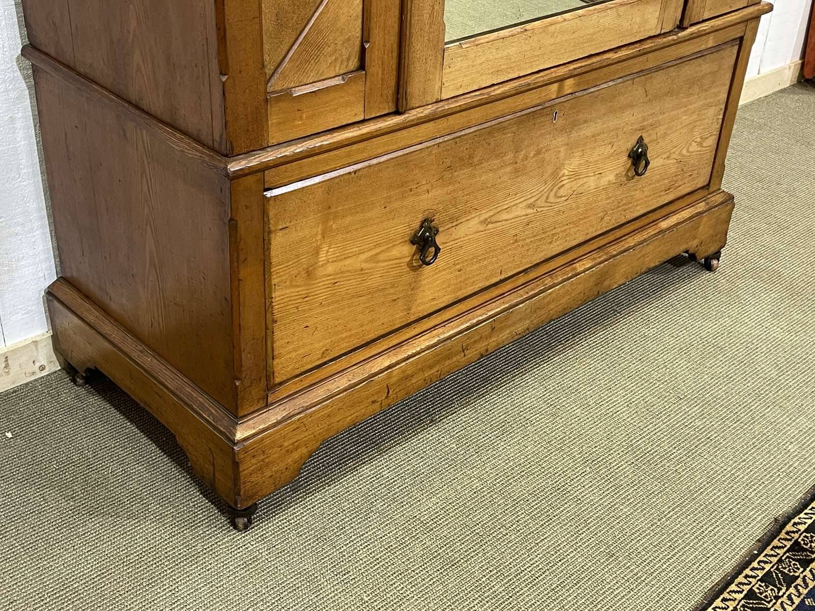 English oak wardrobe from the early 20th century.