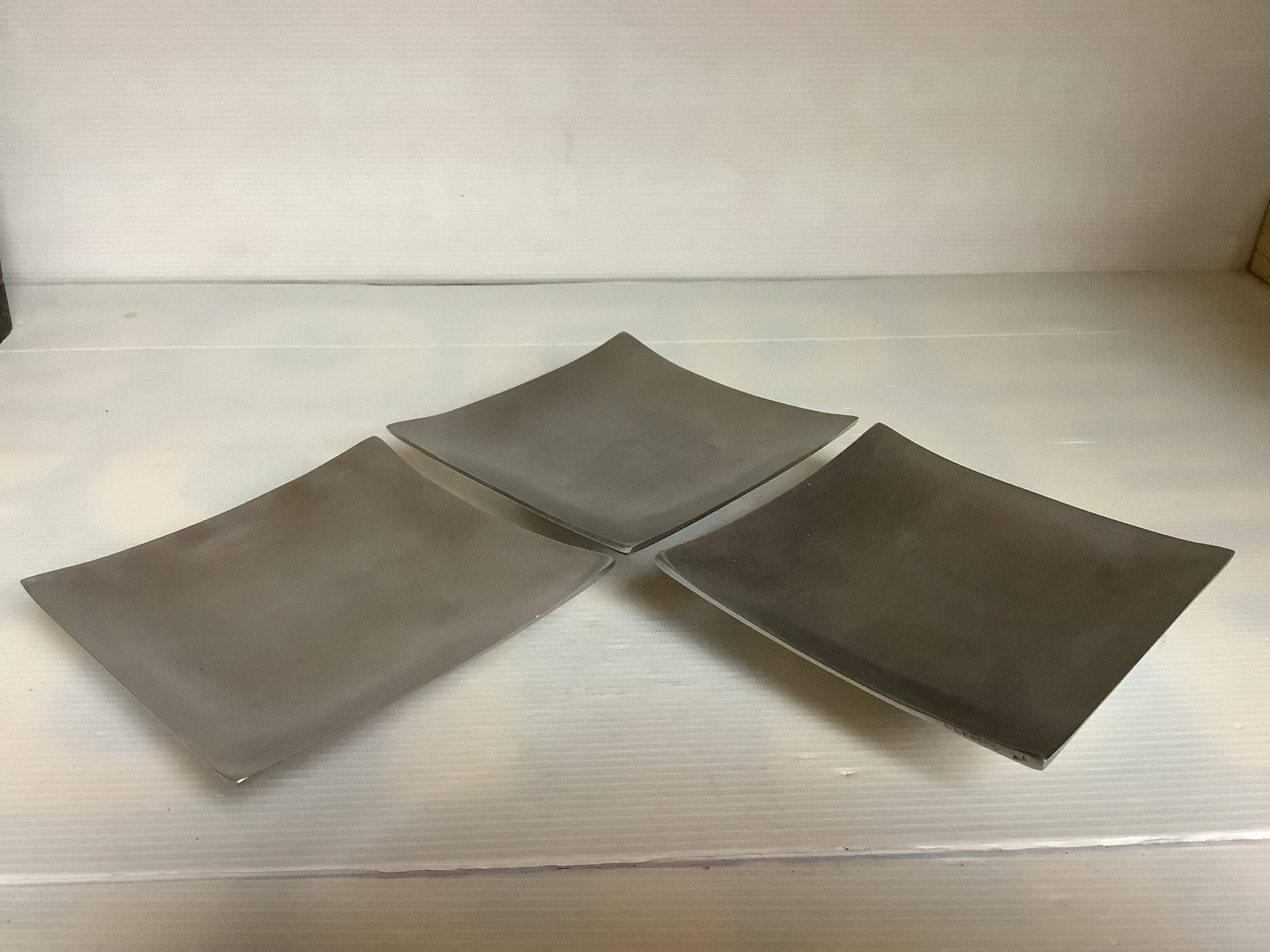 Three silver-plated metal trinket trays/candle holders