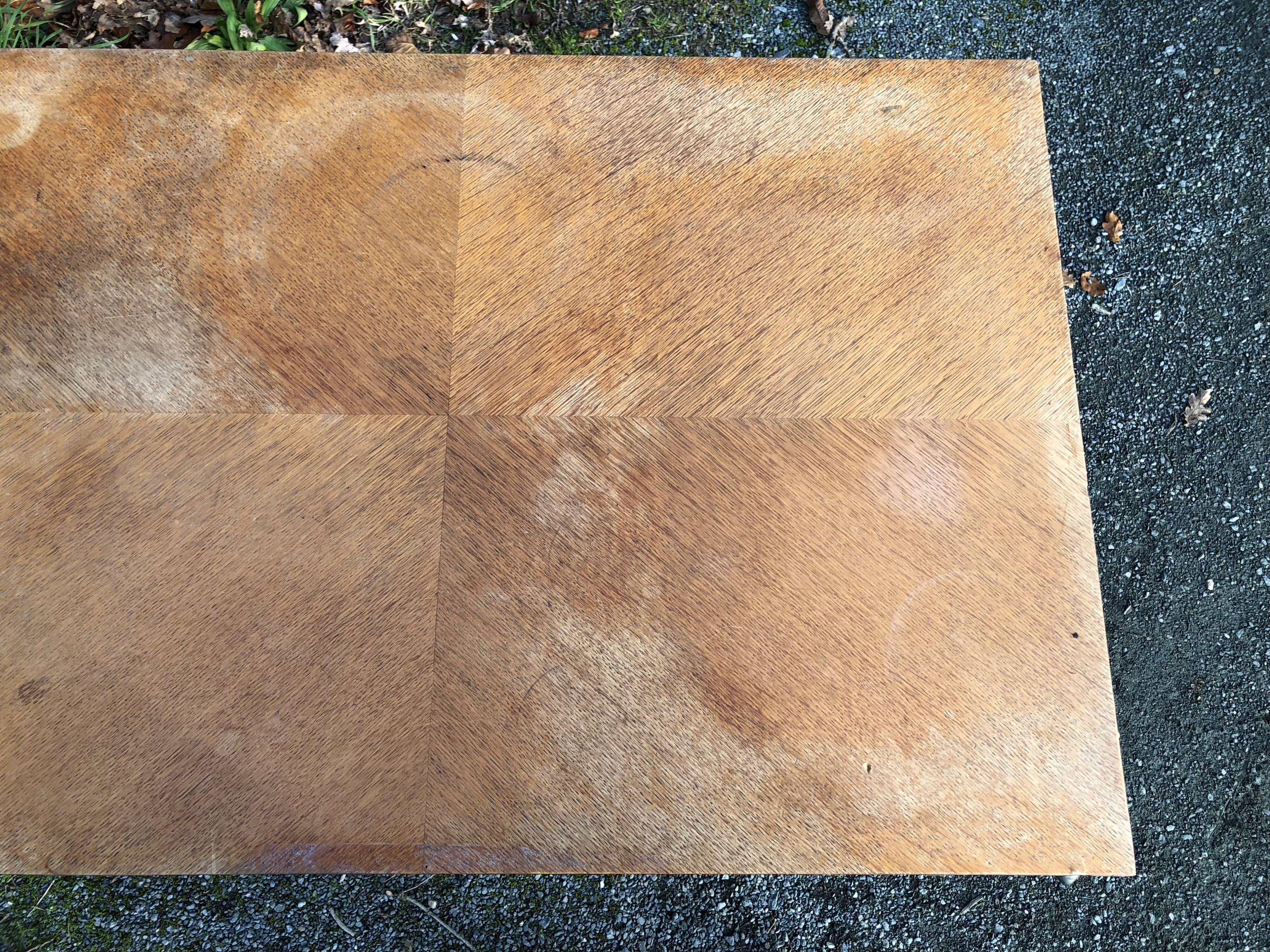 Vintage so-called portfolio table with oak compass base and its oak cp swivel top.