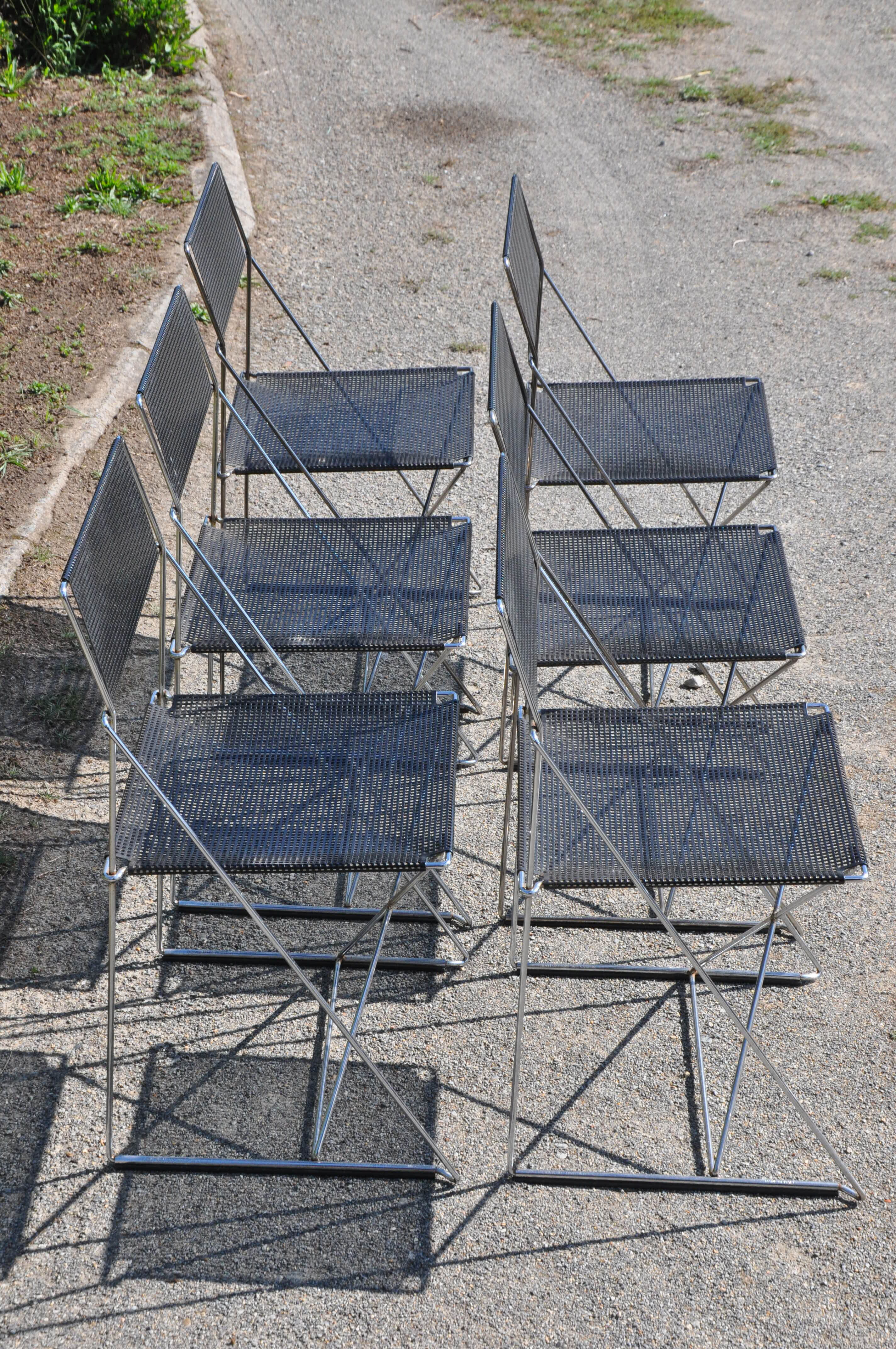Nuova x line omli chairs by Niels Jørgen Haugesen