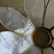 Brass chandelier and flowers in mother-of-pearl petals