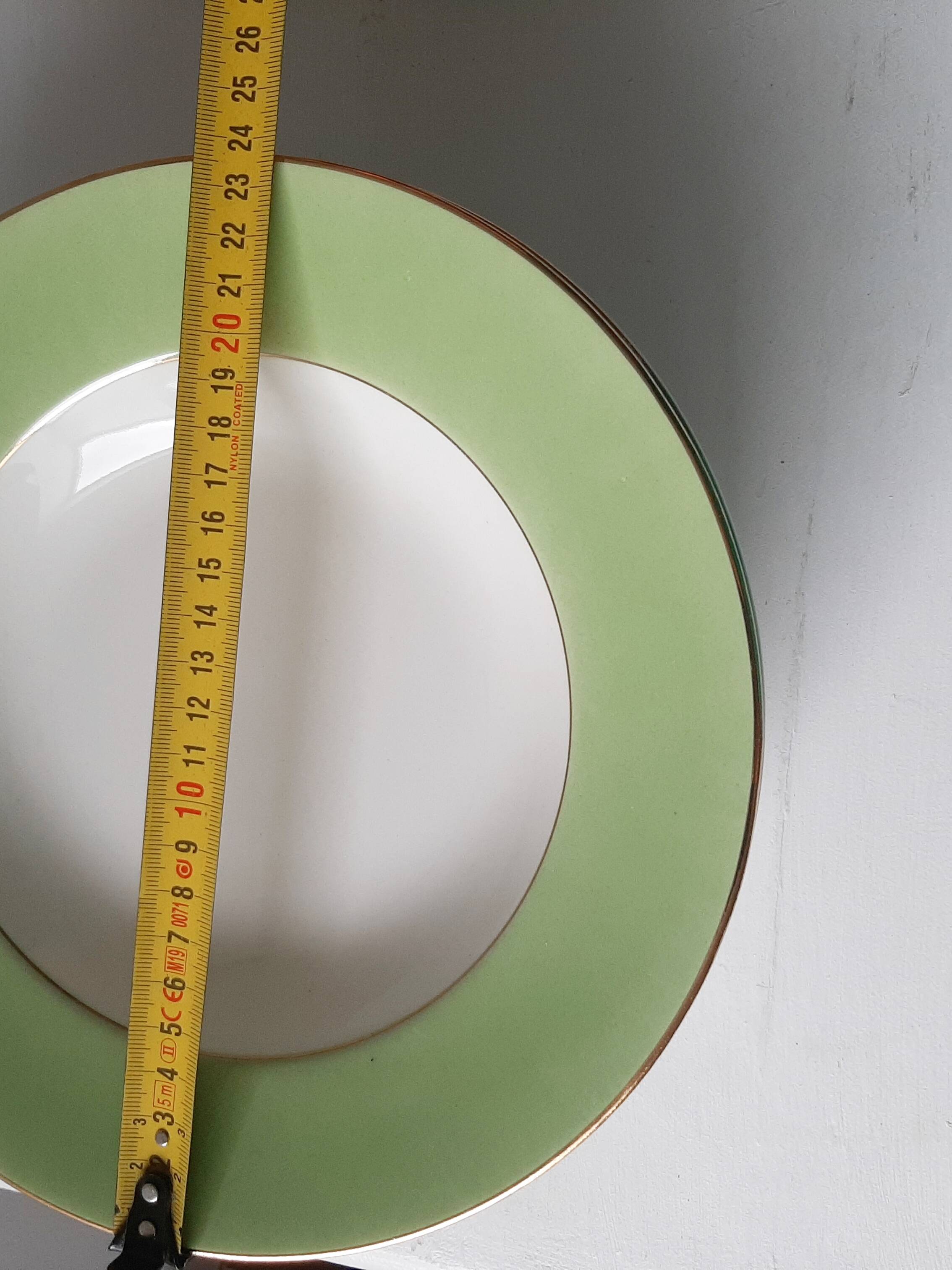 Vintage white and green deep plates stamped Arcachon.